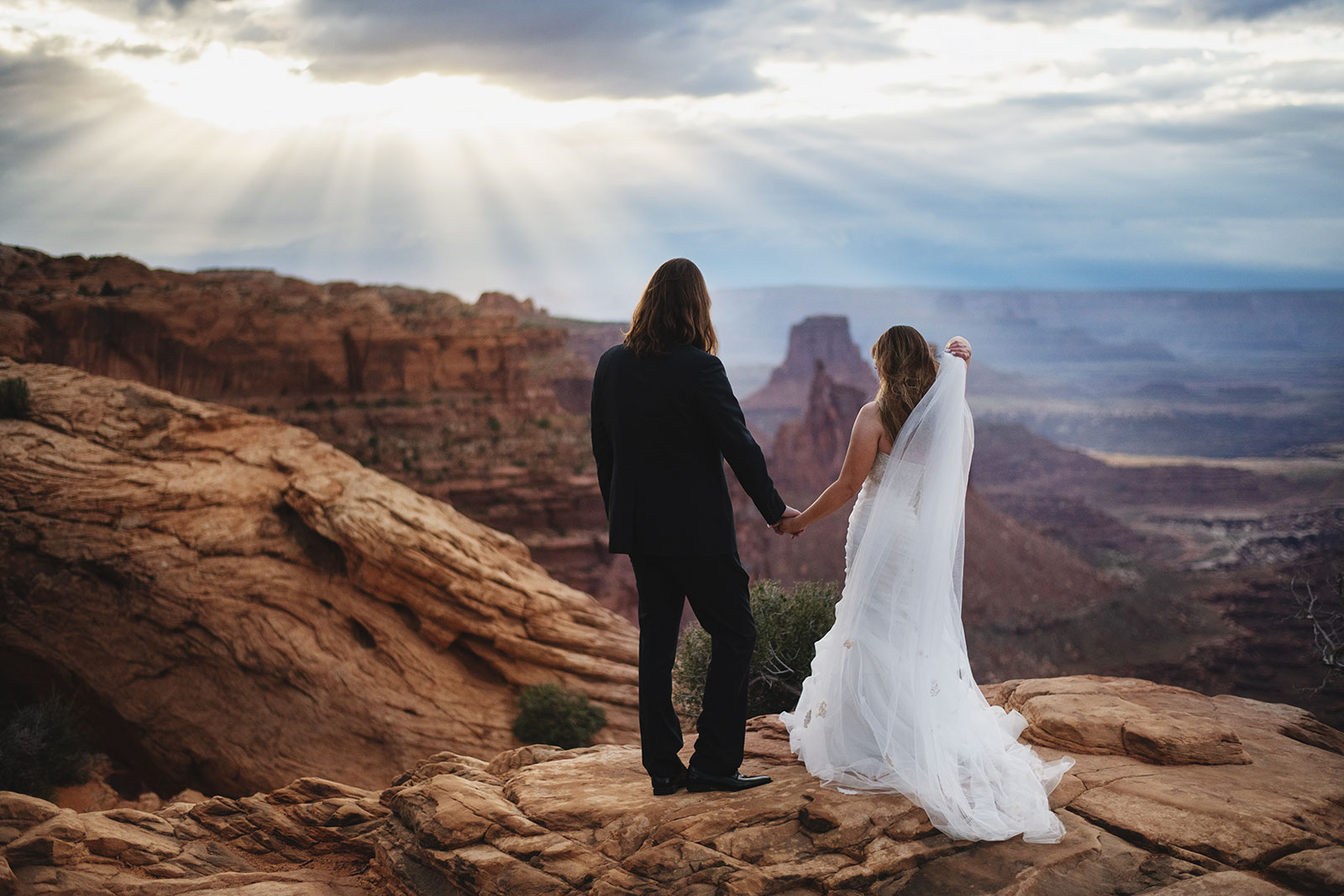 Adventure wedding portraits in arches and Canyonlands national parks.