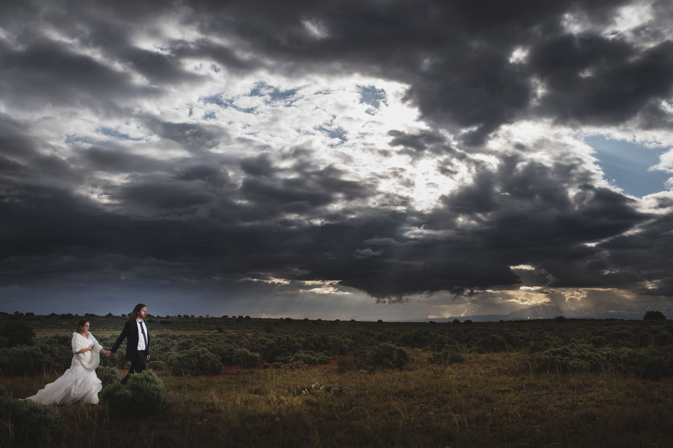 Adventure wedding portraits in arches and Canyonlands national parks.