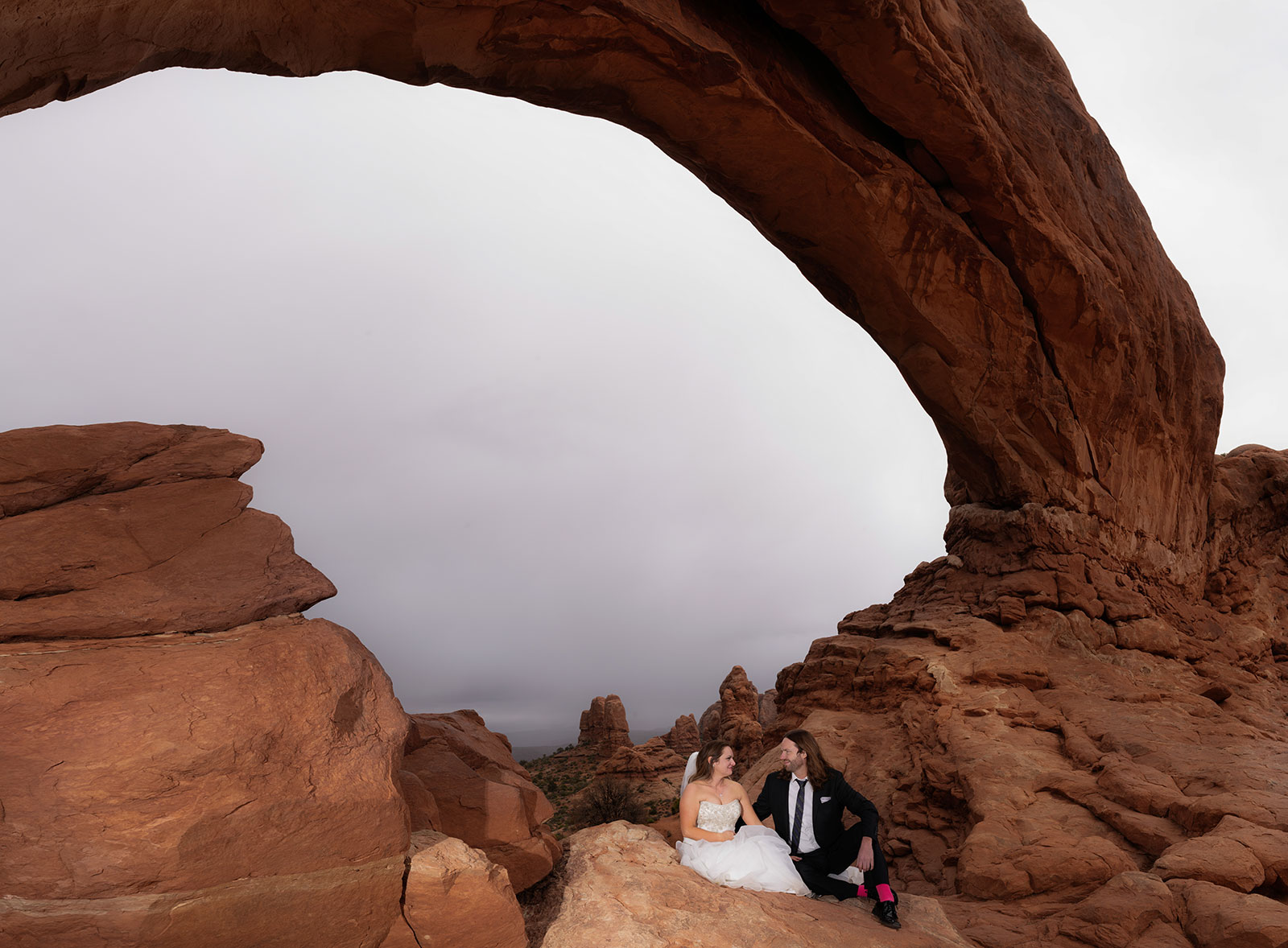 Adventure wedding portraits in arches and Canyonlands national parks.