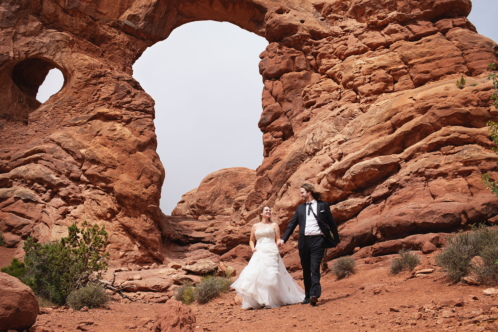 Adventure wedding portraits in arches and Canyonlands national parks.