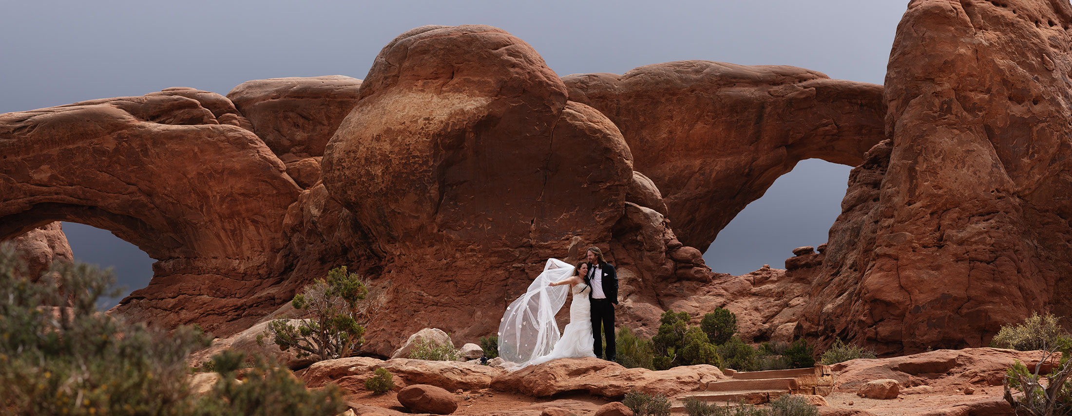 Adventure wedding portraits in arches and Canyonlands national parks.