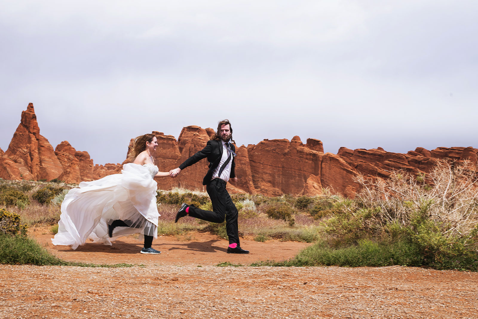 Adventure wedding portraits in arches and Canyonlands national parks.