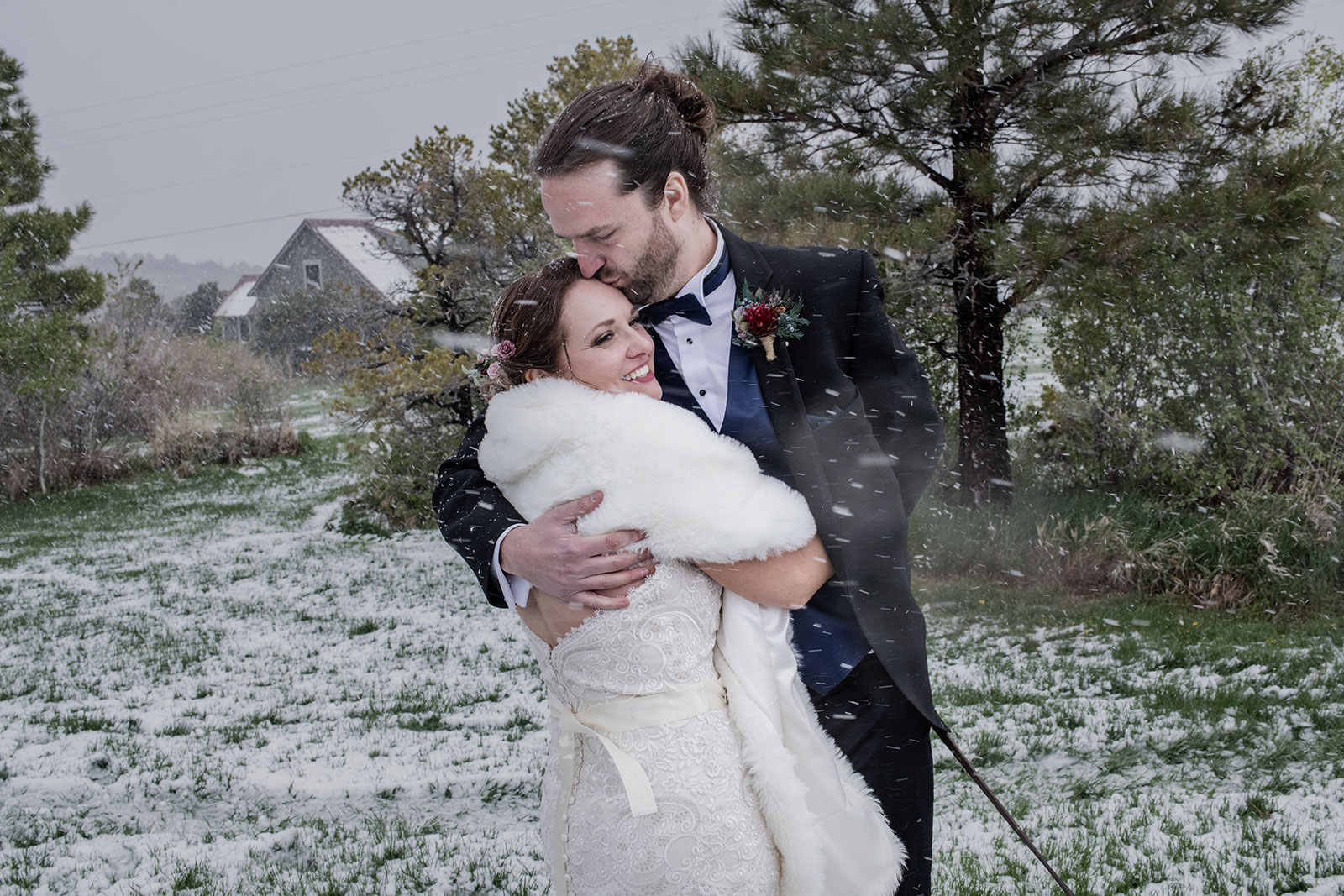 A Moab wedding up in the mountains with snow.